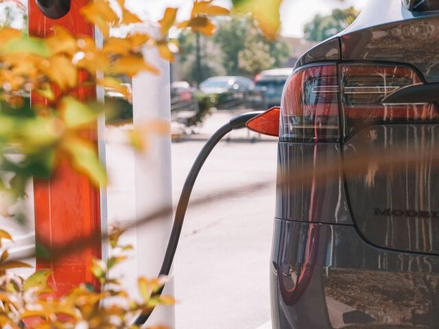 Electric car connected to a charging cable
