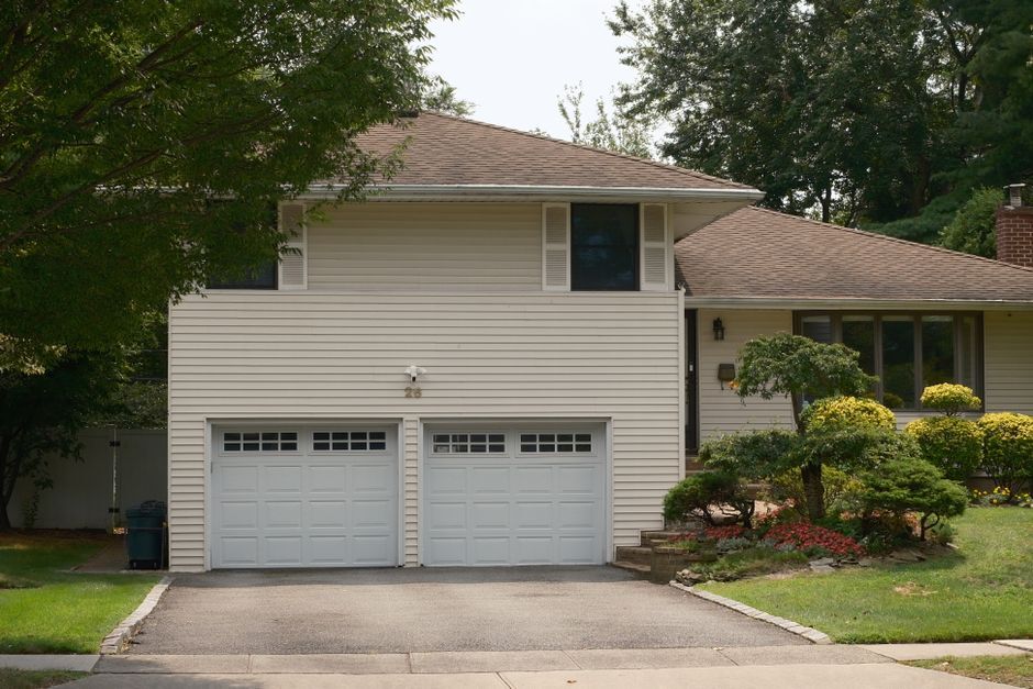 Suburban house with a double garage and driveway