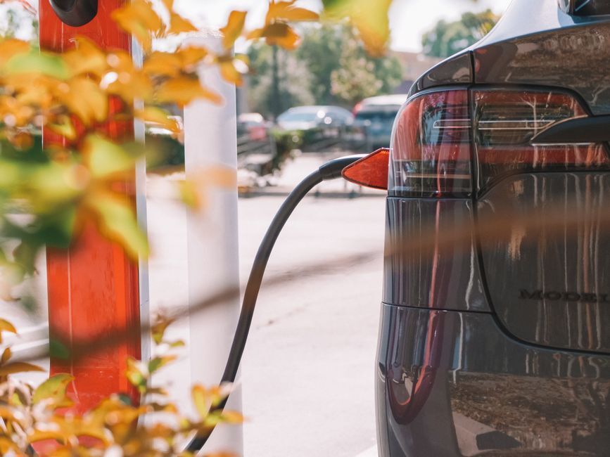 Electric car connected to a charging cable