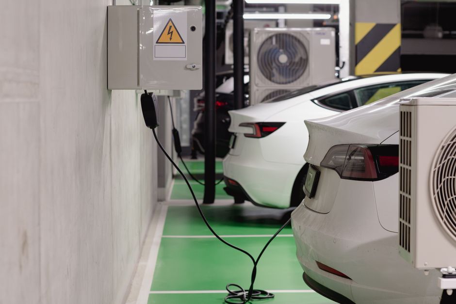 Electric vehicles charging inside a parking garage