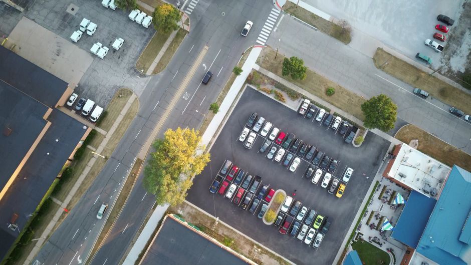 Top-down view of an open surface parking lot