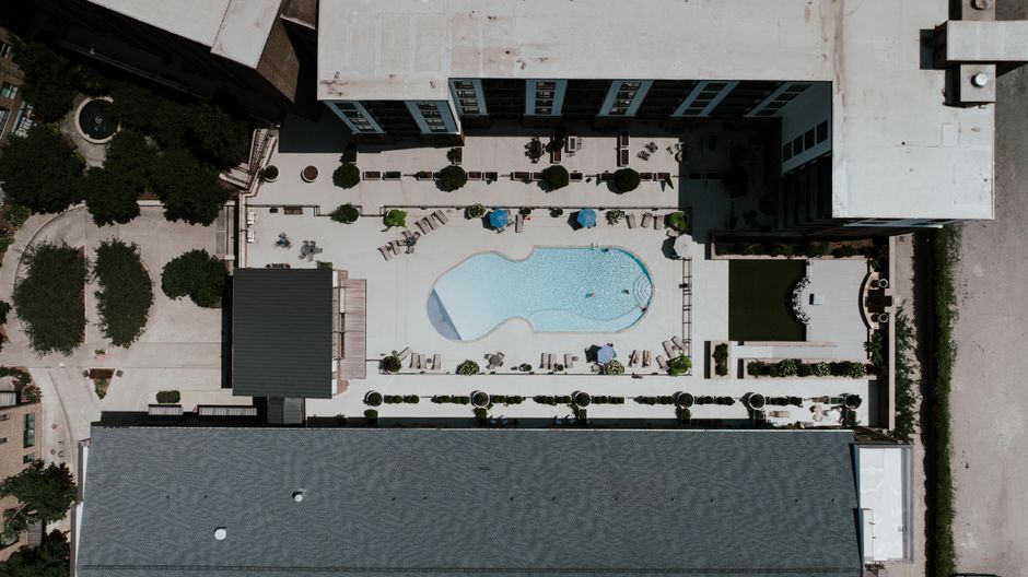 Top-down view of an apartment courtyard pool