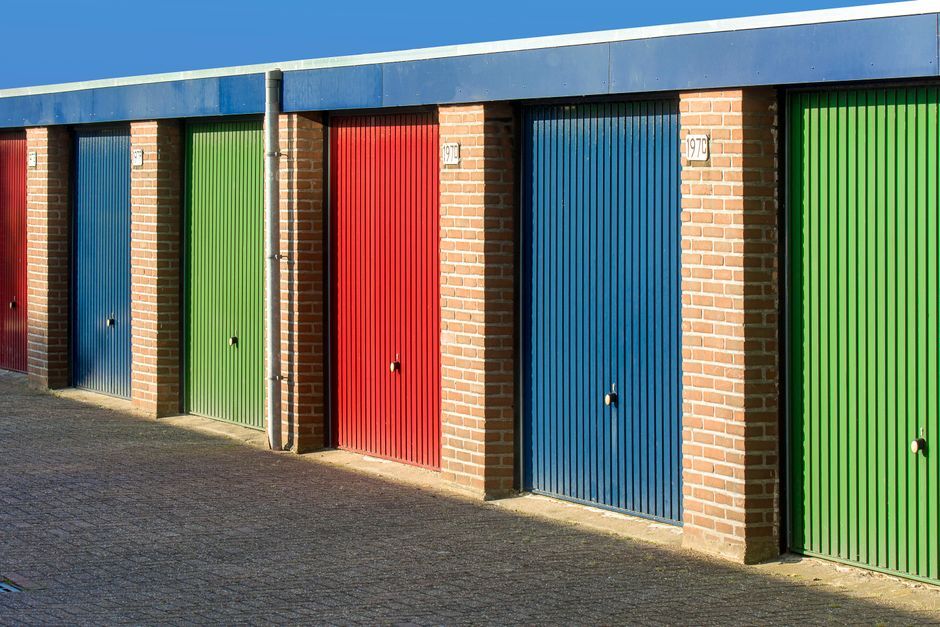 Row of rented garages with colored doors