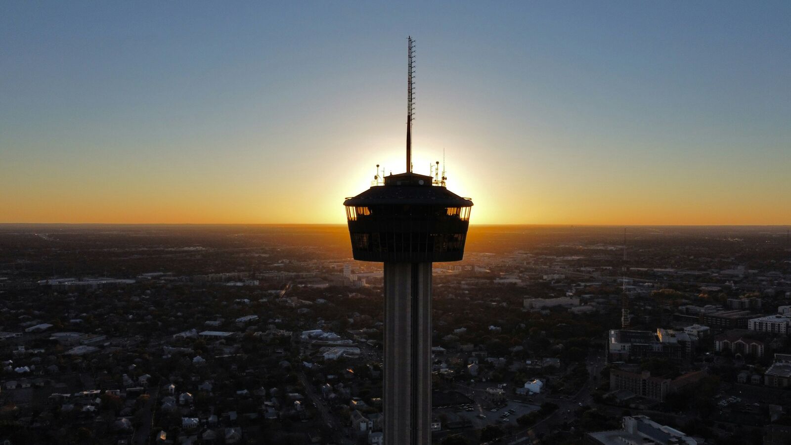 Tower of the Americas silhouetted at dusk over San Antonio